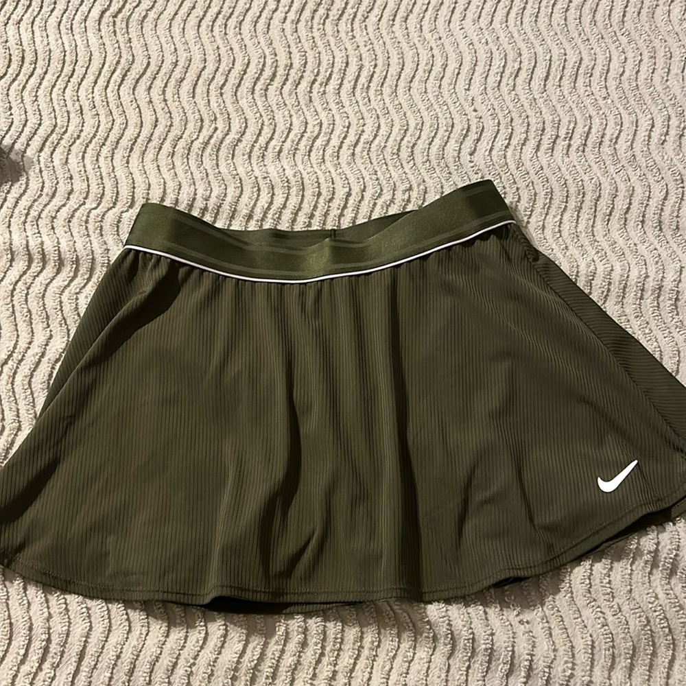 Olive color. May be worn for tennis or pickleball.
